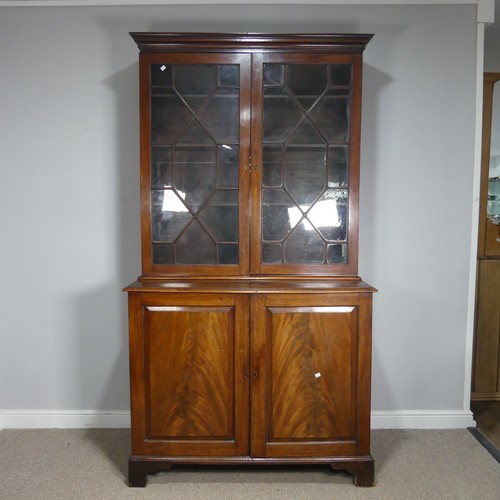 648 - A 19th century mahogany astragal glazed Bookcase, moulded cornice above two glazed cupboard doors co... 