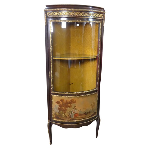 656 - A French Louis XVI style bow-fronted corner display Cabinet, with gilt metal mounts depicting floral... 