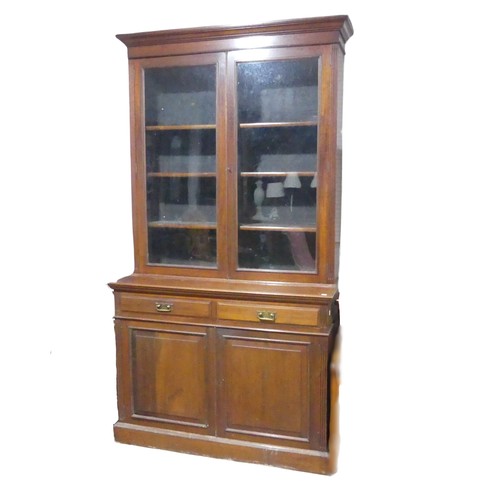 681 - A Victorian mahogany glazed Bookcase, moulded cornice over rectangular glazed doors flanked by reede... 