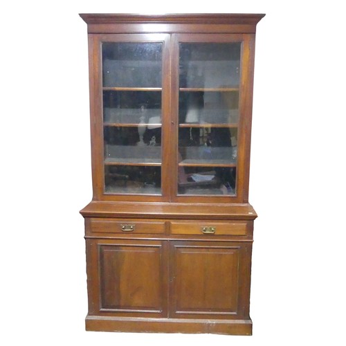 681 - A Victorian mahogany glazed Bookcase, moulded cornice over rectangular glazed doors flanked by reede... 