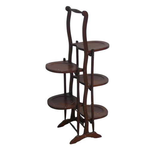 573 - An Edwardian mahogany five-tier folding cake Stand, W 45 cm x H 91 cm x D 25.5 cm.... 