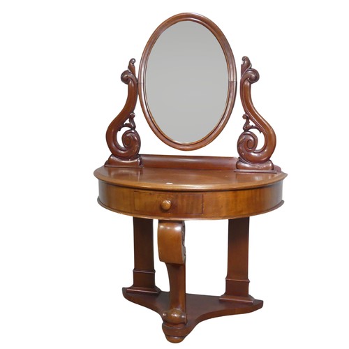 685 - A Victorian mahogany demilune dressing Table, bevelled oval mirror flanked by carved scroll supports... 