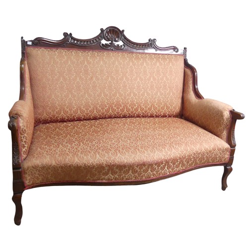 662 - An Edwardian mahogany framed three-seat parlour Sofa, with carved shell and scroll pediment above up... 