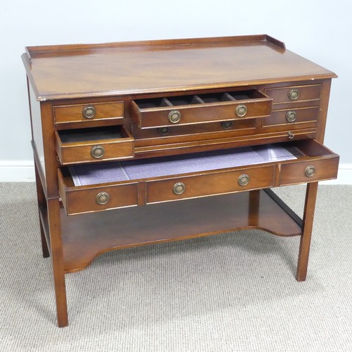 615 - A mahogany cutlery Server / Stand, probably by Bevan funnell, rectangular top with low gallery ... 