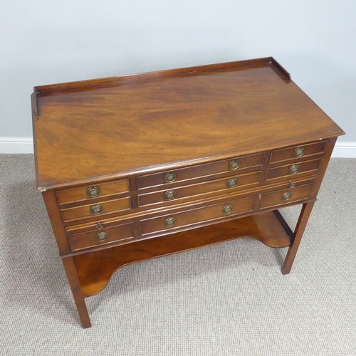 615 - A mahogany cutlery Server / Stand, probably by Bevan funnell, rectangular top with low gallery ... 