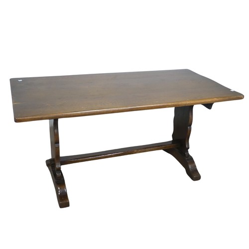 609 - A craftsman style oak refectory dining Table, retailed by 'Shepherd & Hedger, Southampton', labe... 