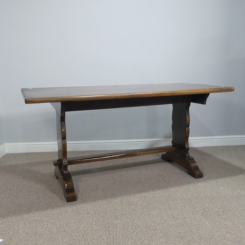 609 - A craftsman style oak refectory dining Table, retailed by 'Shepherd & Hedger, Southampton', labe... 