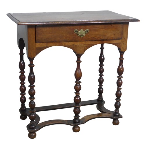 611 - An antique Queen Anne style oak side Table, rectangular overhanging moulded top above singular friez... 