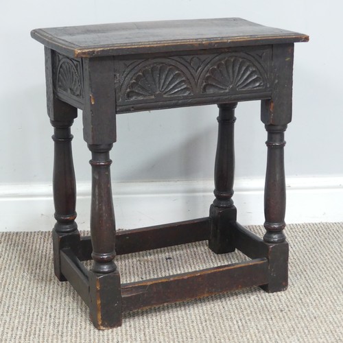 617 - An 18th century oak joint Stool, moulded rectangular top above carved frieze, raised on turned legs ... 