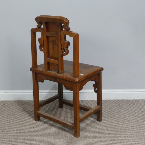 126 - A 20th century carved Chinese hall Chair, scrollwork back with centre panel carved with figure and f... 