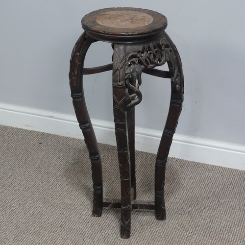 127 - A Chinese carved hardwood and pink marble circular Plant Stand, circa 1900, probably Padouk Wood, wi... 