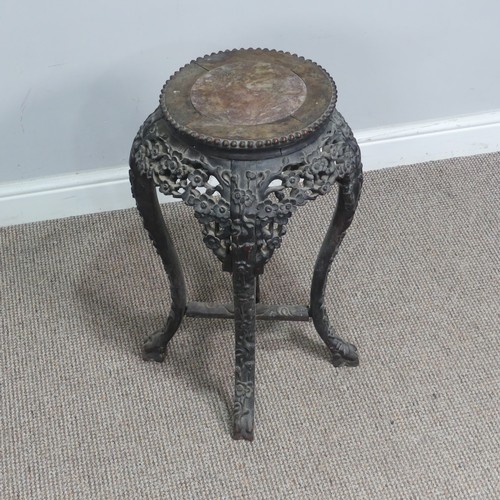 127 - A Chinese carved hardwood and pink marble circular Plant Stand, circa 1900, probably Padouk Wood, wi... 