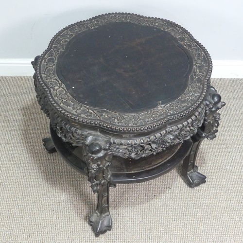 128 - A large Chinese carved hardwood centre / occasional Table, circa 1900, top with smooth flower centre... 