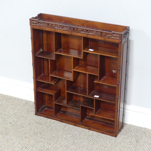 137 - A Chinese hardwood snuff bottle display wall Cabinet, with asymmetrical shelves and bamboo style edg... 