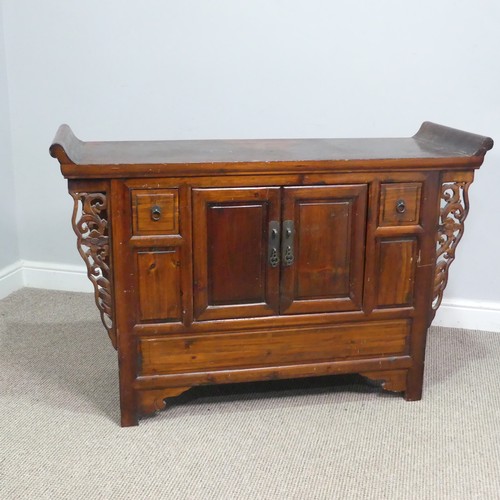 139 - A Chinese stained softwood altar Table, scrolled top above two cupboard doors flanked by small squar... 