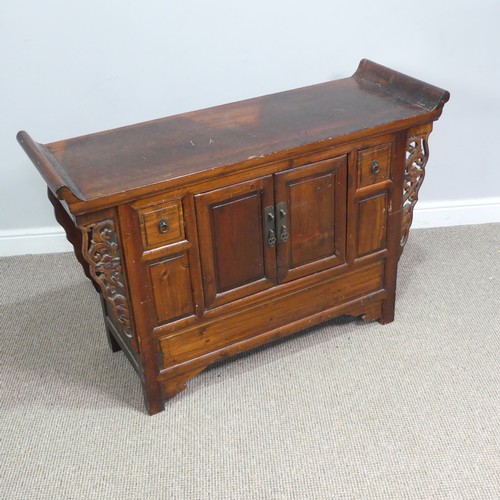 139 - A Chinese stained softwood altar Table, scrolled top above two cupboard doors flanked by small squar... 