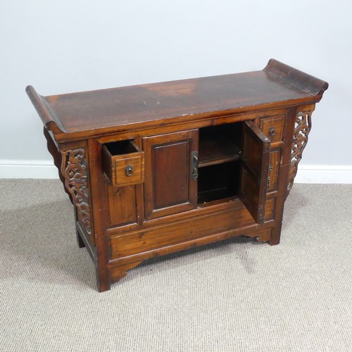 139 - A Chinese stained softwood altar Table, scrolled top above two cupboard doors flanked by small squar... 