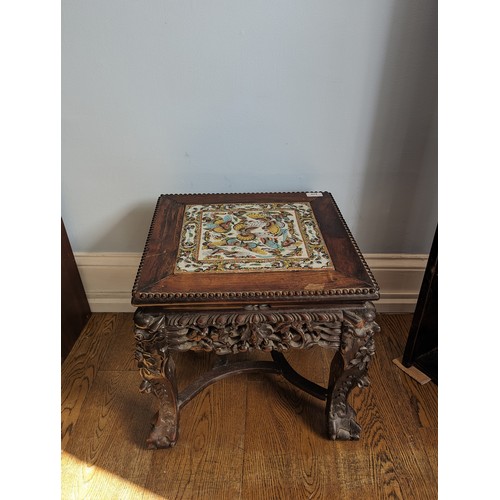 143 - An unusual antique Chinese carved hardwood tile top side Table / Plant Stand, square top inset with ... 