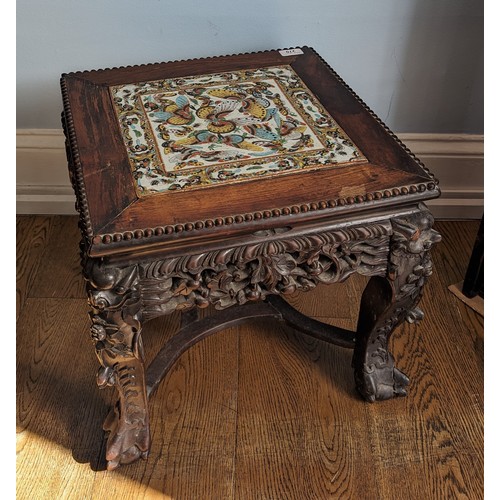 143 - An unusual antique Chinese carved hardwood tile top side Table / Plant Stand, square top inset with ... 