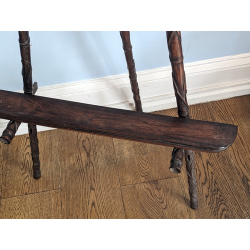 144 - An antique Chinese hardwood artists Easel, with carved and pierced foliate pediment raised on three ... 