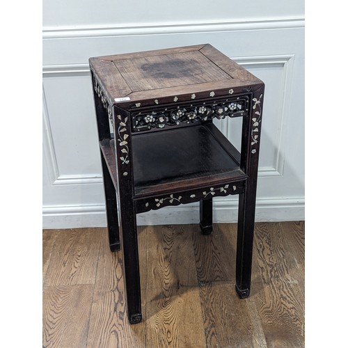 146 - An antique Chinese hardwood and mother of pearl inlaid two-tiered side Table, square top above carve... 