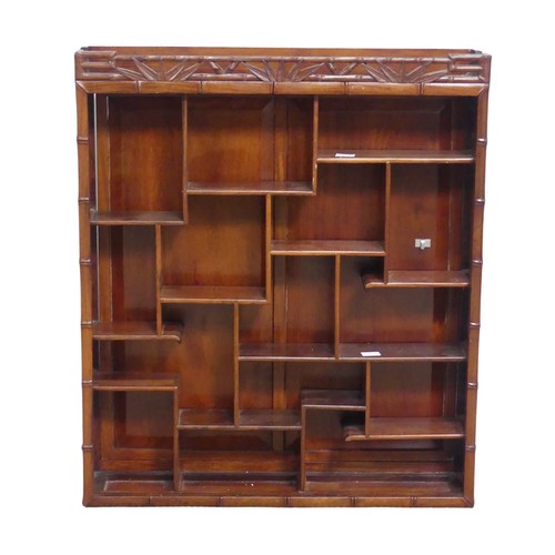 137 - A Chinese hardwood snuff bottle display wall Cabinet, with asymmetrical shelves and bamboo style edg... 