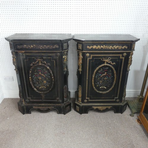 584 - A pair of Moroccan style black lacquered and gilt Cabinets, marbles tops above central gilt metal fo... 