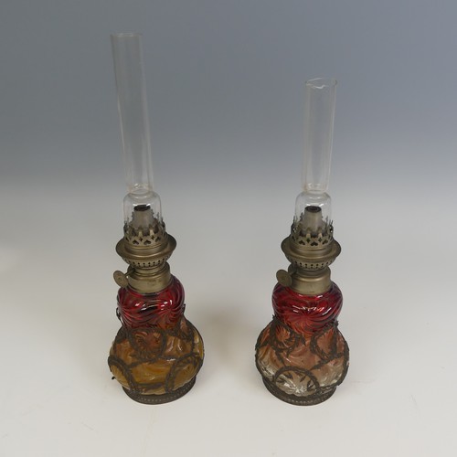 709 - A pair of unusual Wild & Wessel cranberry glass oil Lamps, Berlin, marked 'W & W / Kosmos', ... 