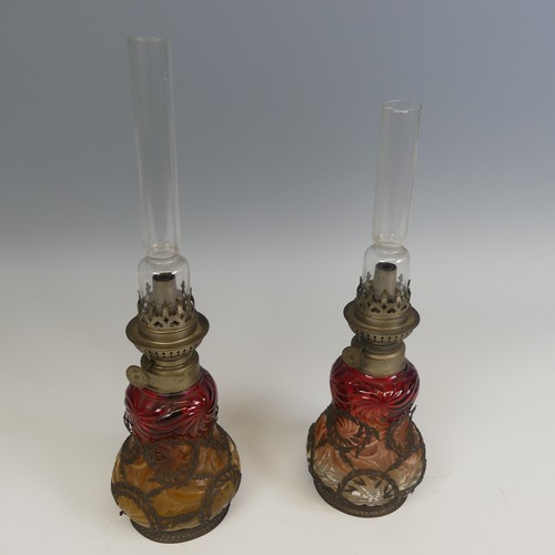 709 - A pair of unusual Wild & Wessel cranberry glass oil Lamps, Berlin, marked 'W & W / Kosmos', ... 