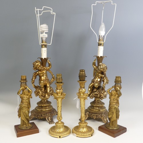 534 - A pair of 20th century gilt brass Cherub table Lamps, raised on scroll and pierced bases, H 66 cm, t... 