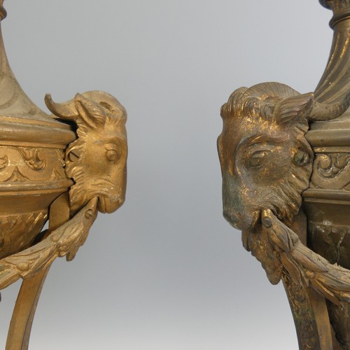 538 - A pair of large French 19th century gilt metal Garnitures, the tops of urn form, both with flame fin... 