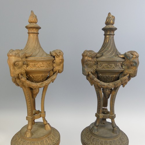 538 - A pair of large French 19th century gilt metal Garnitures, the tops of urn form, both with flame fin... 