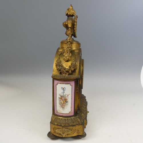 375 - A late 19th century French gilt metal and Sevres style porcelain inset mantel Clock, in the Louis XV... 