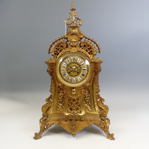 371 - A large antique French ormolu style gilt metal Mantel Clock, enameled Roman numeral dial, encased in... 