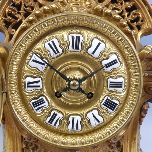 371 - A large antique French ormolu style gilt metal Mantel Clock, enameled Roman numeral dial, encased in... 