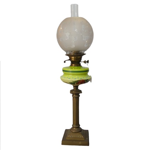 526 - An antique brass corinthian column Oil Lamp, painted Bohemian style glass reservoir, stamped 'Britis... 