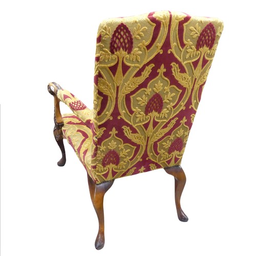 675 - A George III style stained open Armchair, with Art Nouveau inspired upholstery and scroll carved arm... 