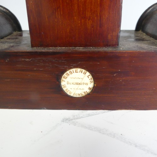 548 - An Edwardian mahogany carved Plate Stand by Tessiers Ltd silversmiths, bearing label to back, H 32.5... 