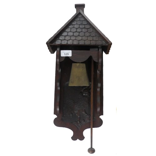 529 - An unusual Arts and Crafts carved oak wall Bell / Doorbell, base carved with cockerel, H 55 cm.... 