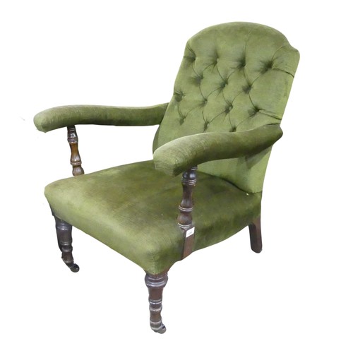 655 - A Victorian upholstered button back open Armchair, raised on turned front legs and splayed rear legs... 