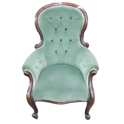 663 - A Victorian walnut framed upholstered Armchair, hoop button-back above scroll walnut arms and serpen... 