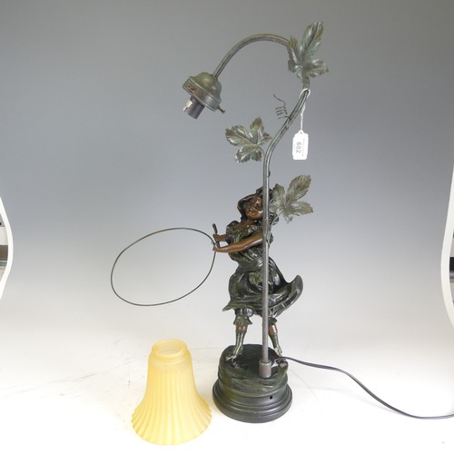 682 - A reproduction bronzed resin Lamp, with damages see images, H 60 cm.