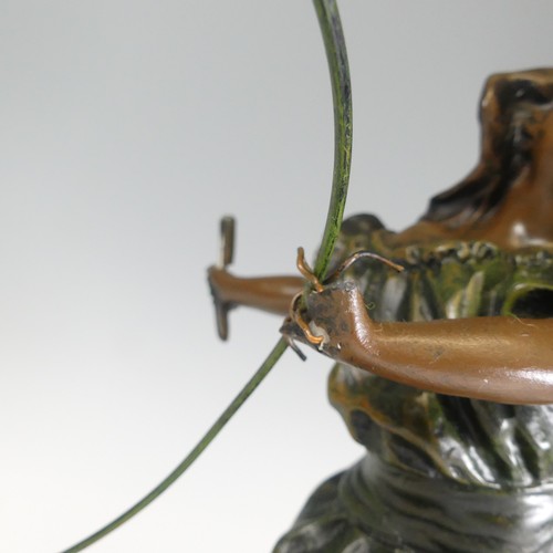 682 - A reproduction bronzed resin Lamp, with damages see images, H 60 cm.