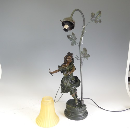 682 - A reproduction bronzed resin Lamp, with damages see images, H 60 cm.