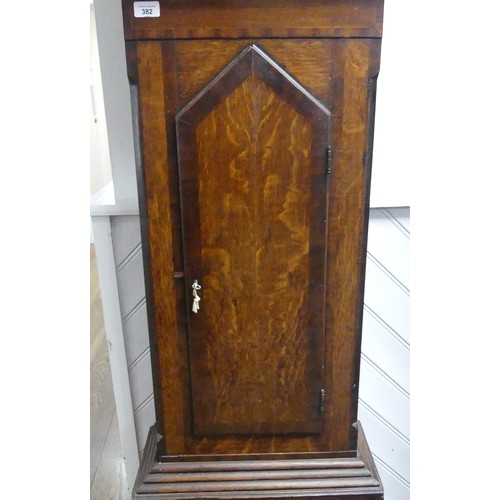 382 - A 19th century northern mahogany Longcase Clock, the arched hood above a glazed door flanked by turn... 