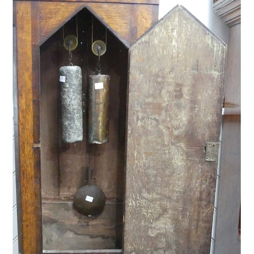 382 - A 19th century northern mahogany Longcase Clock, the arched hood above a glazed door flanked by turn... 