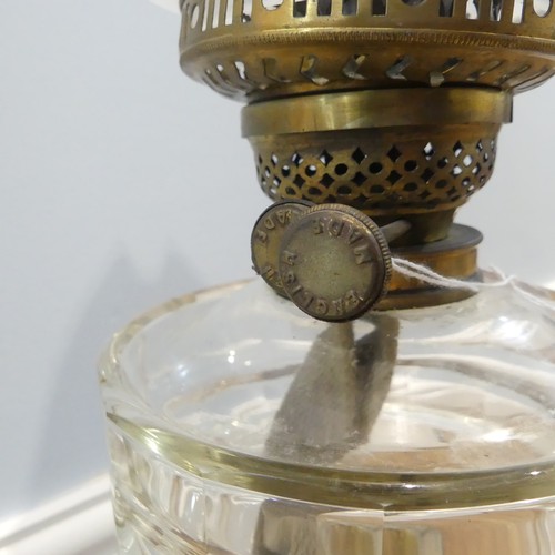 528 - An antique clear glass and brass Oil Lamp, stamped 'English Made', with fluted frosted and etched gl... 