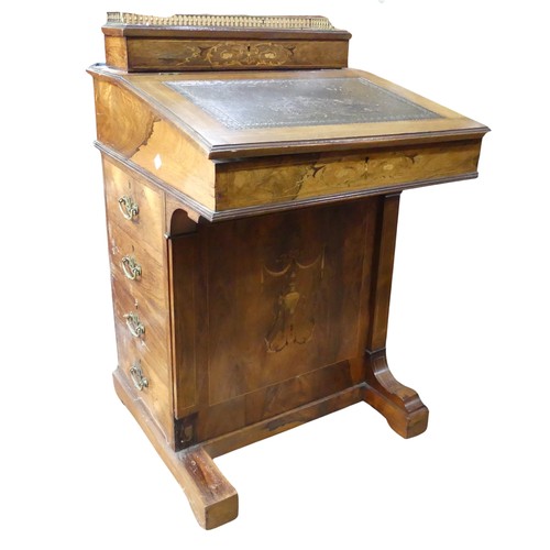 701 - An antique Davenport desk, with stylised floral and urn inlay, brass three quarter gallery to hinged... 