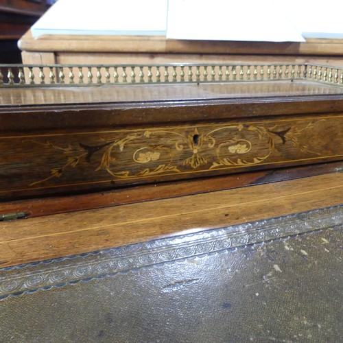 701 - An antique Davenport desk, with stylised floral and urn inlay, brass three quarter gallery to hinged... 