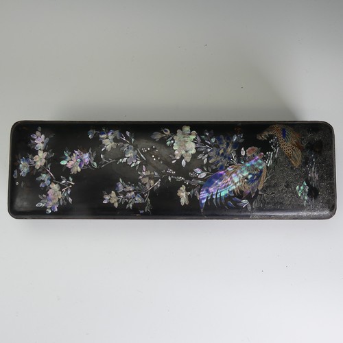 106 - An antique Japanese lacquer Scholar's Box, decorated heavily with mother of pearl inlays depicting c... 